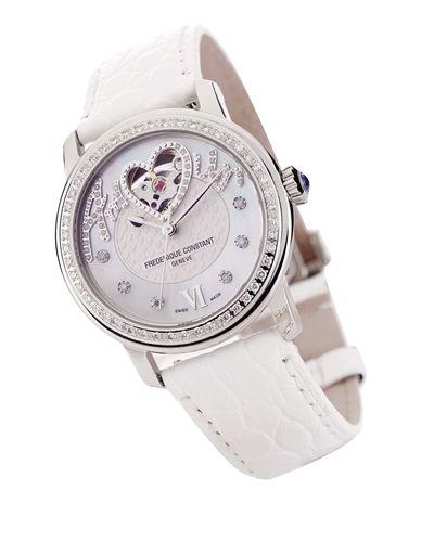 康斯登心跳系列腕表（35500元）：面盘中央以钻石镶嵌Amour(法文“爱”)字样。