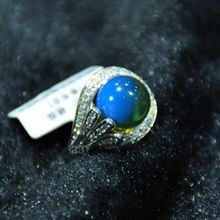 墨西哥蓝珀戒指一般多少钱？看蓝珀戒指的留皮雕刻手法