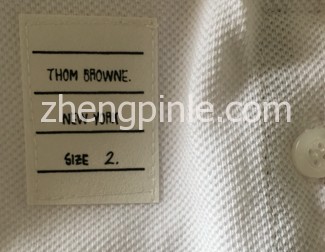 假thom browne汤姆布朗签名标和纽扣